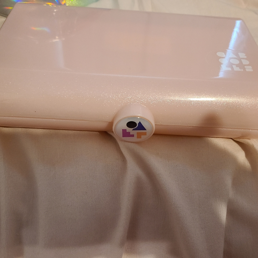 Light pink travel caboodles